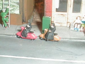 sistersonscooters.jpg